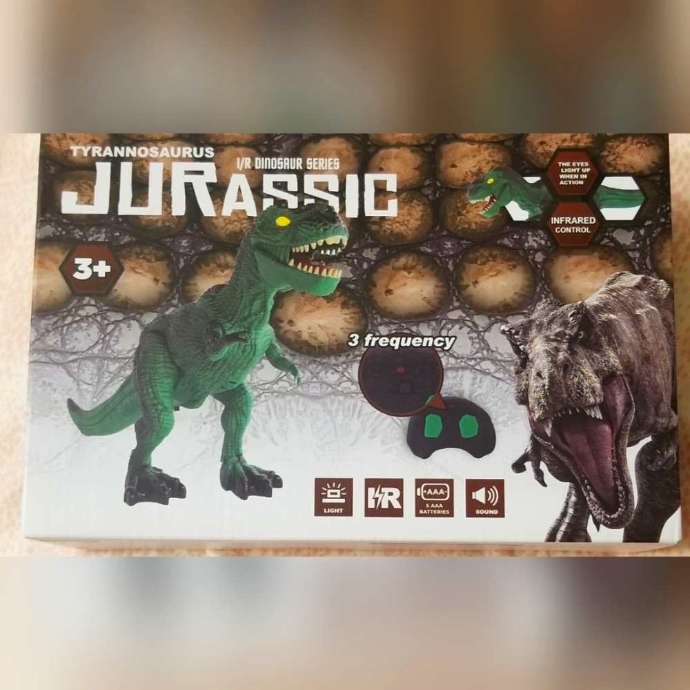 Brand new Kids Remote Control T-Rex W/ Light-Up LED Eyes and Roaring Sounds
